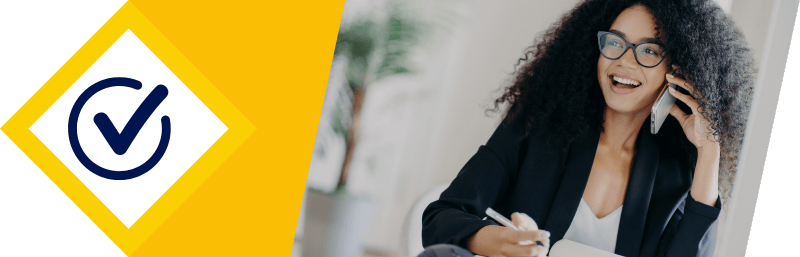 Smiling client on phone with checkmark booking Miami handyman service