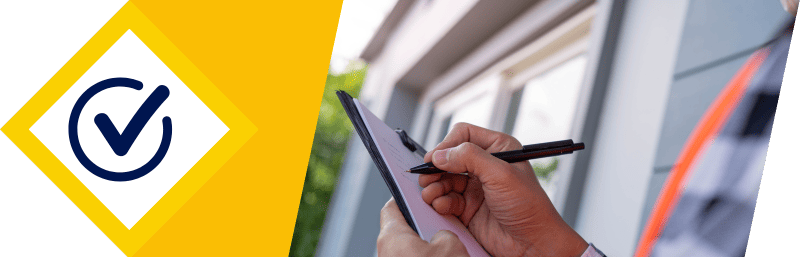 Miami handyman inspecting home and taking notes for repair services